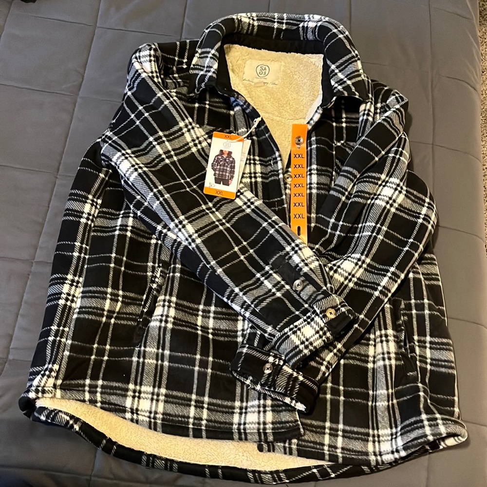 Brand new ladies plush shirt jacket in black plaid